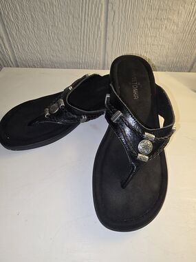 Minnetonka Black Leather Toe-Post Sandals with Silver Concho